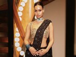 Nysa Devgan wore an emerald and diamond choker.