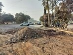 The road near Iffco Chowk metro station undergoing repairs. (Parveen Kumar/HT) The road near Iffco Chowk metro station undergoing repairs. (Parveen Kumar/HT)