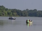 Visitors enjoying the sunny weather at Sukhna Lake in Chandigarh on Sunday. (Sanjeev Sharma/HT) Visitors enjoying the sunny weather at Sukhna Lake in Chandigarh on Sunday. (Sanjeev Sharma/HT)