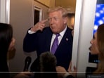 Donald Trump answering questions about his recent health scans, aboard Air Force One.