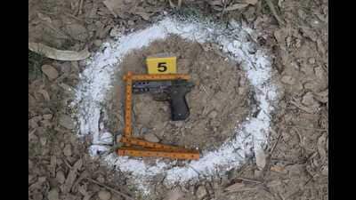 A pistol seized from the accused. (HT)