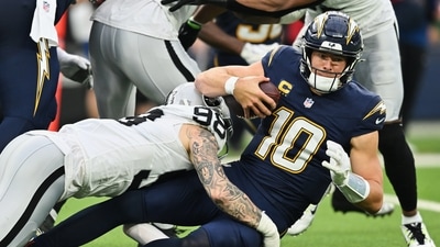 Las Vegas Raiders defensive end Maxx Crosby (98) sacks Los Angeles Chargers quarterback Justin Herbert (10) during the second half of an NFL football game, Sunday, Nov. 30, 2025, in Inglewood, California. (AP)