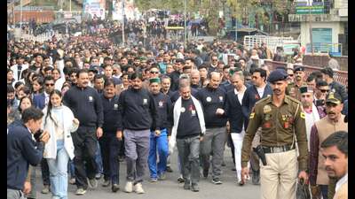 The CM accompanied the children throughout the entire stretch till the concluding point of the rally, giving clear message of the commitment of the government to wipe out chitta and other drugs from the State. (HT Photo)