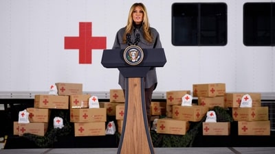 First lady Melania Trump speaks at a Red Cross holiday care package event inside a hangar on December 1, 2025, at Joint Base Andrews, Maryland. The event is part of the American Red Cross Service to the Armed Forces (SAF), which supports the military, veterans and their families. (Getty Images via AFP) First lady Melania Trump speaks at a Red Cross holiday care package event inside a hangar on December 1, 2025, at Joint Base Andrews, Maryland. The event is part of the American Red Cross Service to the Armed Forces (SAF), which supports the military, veterans and their families. (Getty Images via AFP)
