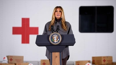 First lady Melania Trump speaks at a Red Cross holiday care package event inside a hangar on December 1, 2025, at Joint Base Andrews, Maryland. The event is part of the American Red Cross Service to the Armed Forces (SAF), which supports the military, veterans and their families. (Getty Images via AFP) First lady Melania Trump speaks at a Red Cross holiday care package event inside a hangar on December 1, 2025, at Joint Base Andrews, Maryland. The event is part of the American Red Cross Service to the Armed Forces (SAF), which supports the military, veterans and their families. (Getty Images via AFP)