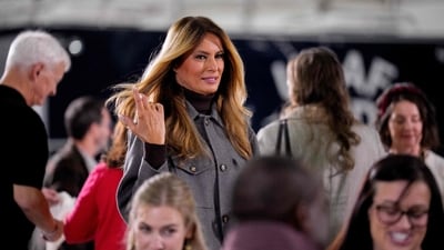 First lady Melania Trump attends a Red Cross holiday care packages making event inside a hangar on December 1, 2025, at Joint Base Andrews, Maryland. The event is part of the American Red Cross Service to the Armed Forces (SAF), which supports the military, veterans and their families. (Getty Images via AFP) First lady Melania Trump attends a Red Cross holiday care packages making event inside a hangar on December 1, 2025, at Joint Base Andrews, Maryland. The event is part of the American Red Cross Service to the Armed Forces (SAF), which supports the military, veterans and their families. (Getty Images via AFP)