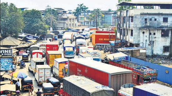 Following the deaths of two schoolchildren last week, residents across Bhiwandi have launched widespread protests against the civic authorities, Thane Police, and the local traffic department for allowing heavy vehicles to move inside the city despite existing restrictions. Locals have been demanding a strict daytime ban on heavy vehicles, citing frequent accidents and severe traffic congestion. Poor road conditions across Bhiwandi continue to worsen the situation. December 01 Pic on Monday in India on 01 2025. (Pramod Tambe)