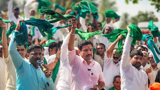 Karnataka BJP chief BY Vijayendra (centre) with farmers during a protest in Belagavi in November 2025. (PTI File Photo)