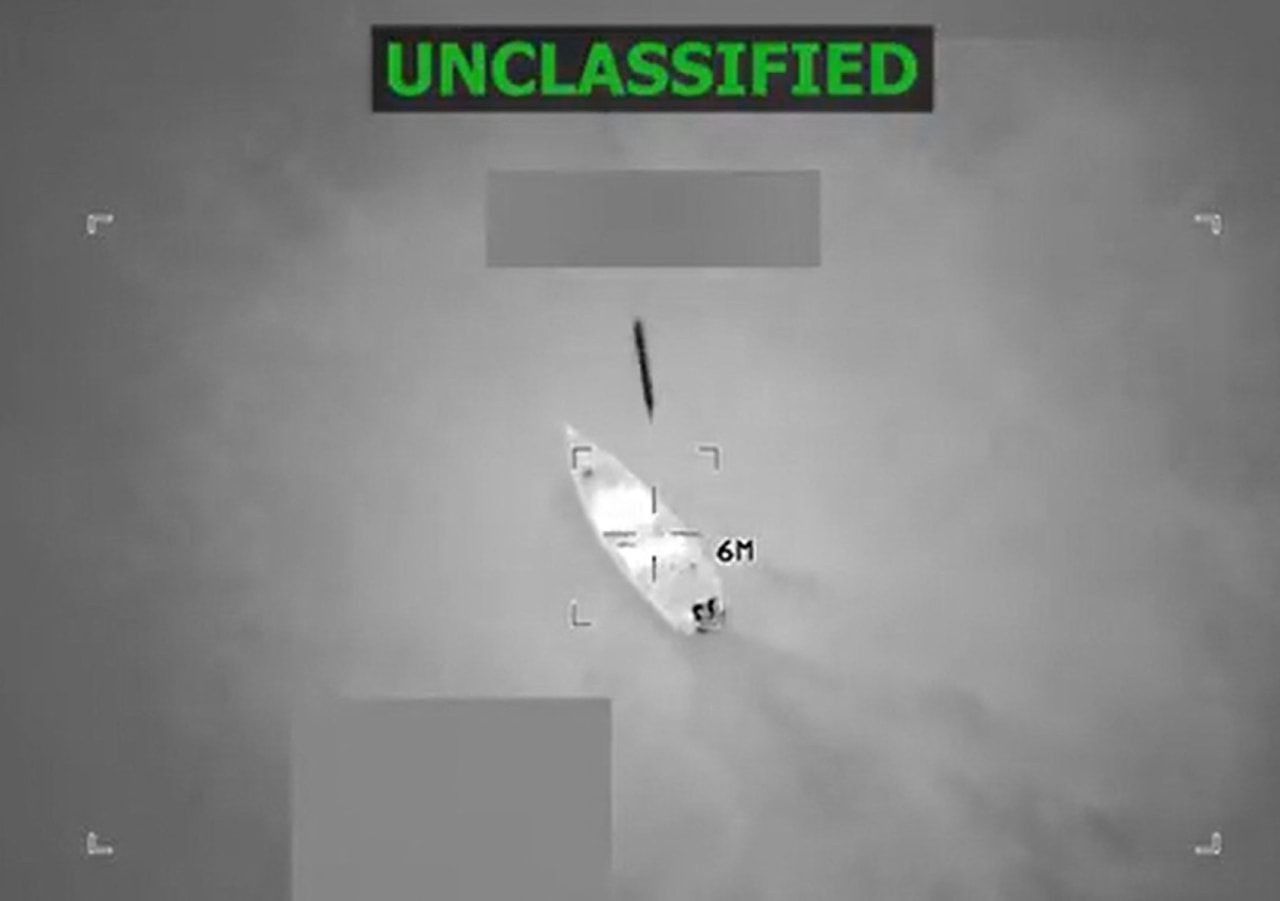 A screengrab from a video posted by U.S. Secretary of Defense Pete Hegseth on his X account on Oct. 24 that he says shows U.S. military forces striking a vessel operated by drug traffickers.