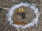 A pistol seized from the accused. (HT) A pistol seized from the accused. (HT)