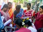 Booth level officers (BLO) and assistant workers check and collect the enumeration forms as residents queue up to submit the forms for the special intensive revision (SIR) of electoral rolls in Bengal’s Siliguri. (ANI) Booth level officers (BLO) and assistant workers check and collect the enumeration forms as residents queue up to submit the forms for the special intensive revision (SIR) of electoral rolls in Bengal’s Siliguri. (ANI)