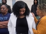 Patrice Williams, who was hosting a party for her daughter where gunfire broke out, middle, is consoled by Teresa Spivey, right, while being interviewed in Stockton, Calif., Monday, Dec. 1, 2025. (AP Photo/Jeff Chiu) Patrice Williams, who was hosting a party for her daughter where gunfire broke out, middle, is consoled by Teresa Spivey, right, while being interviewed in Stockton, Calif., Monday, Dec. 1, 2025. (AP Photo/Jeff Chiu)
