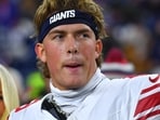 New York Giants quarterback Jaxson Dart wearing his signature necklace, New York Giants quarterback Jaxson Dart wearing his signature necklace,