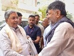 Karnataka Deputy Chief Minister DK Shivakumar welcomes Chief Minister Siddaramaiah for a breakfast meeting at his residence, in Bengaluru Karnataka Deputy Chief Minister DK Shivakumar welcomes Chief Minister Siddaramaiah for a breakfast meeting at his residence, in Bengaluru
