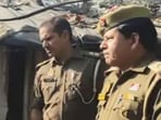 Police officials during a verification drive in a Lucknow slum on Monday. (SOURCED)