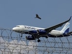File photo: An IndiGo Airlines aircraft flies low as it prepares to land in Mumbai