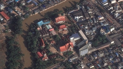A satellite image of floodwater around Mahattamangkalaram temple in Hat Yai, Thailand on November 29. (via REUTERS)