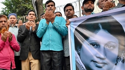File photo of activists in support of Bangladesh's former prime minister Khaleda Zia, hold a banner with her portrait as they pray for her recovery in front of the Evercare Hospital in Dhaka. (AFP) File photo of activists in support of Bangladesh's former prime minister Khaleda Zia, hold a banner with her portrait as they pray for her recovery in front of the Evercare Hospital in Dhaka. (AFP)
