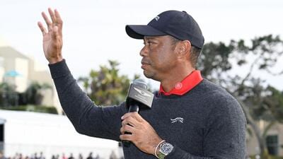 FILE PHOTO: Feb 16, 2025; San Diego, California, USA; Tiger Woods waves to the fans at The Genesis Invitational golf tournament at Torrey Pines. Mandatory Credit: Denis Poroy-Imagn Images/File Photo (USA TODAY Sports via Reuters Con) FILE PHOTO: Feb 16, 2025; San Diego, California, USA; Tiger Woods waves to the fans at The Genesis Invitational golf tournament at Torrey Pines. Mandatory Credit: Denis Poroy-Imagn Images/File Photo (USA TODAY Sports via Reuters Con)