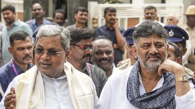Karnataka chief minister Siddaramaiah and deputy chief minister DK Shivakumar speak to the media after their second round of breakfast meeting amid leadership tussle in the state, in Bengaluru, on Tuesday. (PTI) Karnataka chief minister Siddaramaiah and deputy chief minister DK Shivakumar speak to the media after their second round of breakfast meeting amid leadership tussle in the state, in Bengaluru, on Tuesday. (PTI)