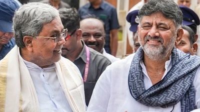 Karnataka chief minister Siddaramaiah and state deputy chief minister DK Shivakumar speak to the media after second round of breakfast meeting amid leadership tussle in the state, in Bengaluru, Tuesday, Dec. 2, 2025. (PTI) Karnataka chief minister Siddaramaiah and state deputy chief minister DK Shivakumar speak to the media after second round of breakfast meeting amid leadership tussle in the state, in Bengaluru, Tuesday, Dec. 2, 2025. (PTI)
