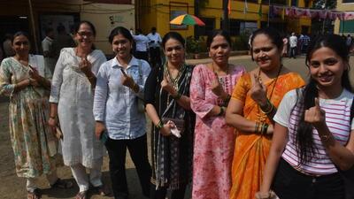 Thane, India - December -02, 2025: KulgaonÐBadlapur Municipal Council (nager Parishad)General Election 2025: In Badlapur, Thane district, voting for the KulgaonÐBadlapur Municipal Council (nager Parishad) has begun on Tuesday Womens voters after cast voting can be seen standing in queues at the polling stations at badalapur East ,in Thane ,in Mumbai, India, on, Tuesday, December -02, 2025. ( Praful Gangurde / HT Photo) (Praful Gangurde)