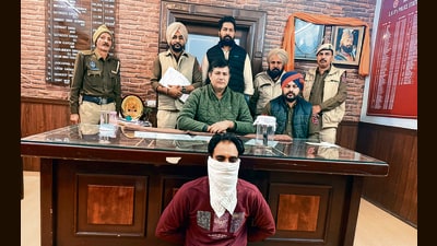 The arrested accused in police custody. (HT Photo)