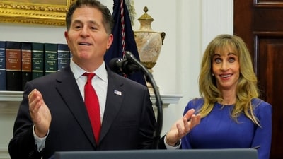 CEO of Dell Technologies Michael Dell speaks, accompanied by his wife Susan Dell, during an announcement about "Trump accounts". (REUTERS)