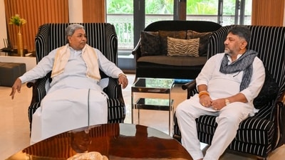 Siddaramaiah on Tuesday morning arrived at Shivakumar's residence, where he was received by the deputy CM and his brother, former MP DK Suresh. (Sourced) Siddaramaiah on Tuesday morning arrived at Shivakumar's residence, where he was received by the deputy CM and his brother, former MP DK Suresh. (Sourced)