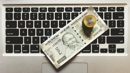 The rupee dropped to a record low of 89.85 to the US dollar before the RBI stepped in. It recovered to 89.7625 thereafter. (Representational/Unsplash)