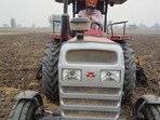 A farmer mulching paddy stubble with rotavator in his field (For representation only)