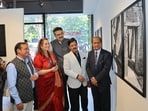 Ajaish Kumar Jaiswal with guests during the photo exhibition Shadows of Time underway at Kokoro Art Gallery in Lucknow(Photo: HT)