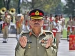 Field Marshal General Asim Munir prays after laying wreath on the Martyrs monument during a special guard of honor ceremony at General Headquarters, in Rawalpindi, Pakistan. (Inter Services Public Relations via AP) Field Marshal General Asim Munir prays after laying wreath on the Martyrs monument during a special guard of honor ceremony at General Headquarters, in Rawalpindi, Pakistan. (Inter Services Public Relations via AP)