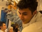 Video shows Emre Nalçakar handcuffing passenger in metro.