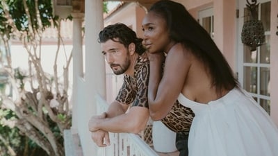 Venus Williams is seen in a white Prada halter dress, standing beside Preti during. (Instagram/ Venus Williams) Venus Williams is seen in a white Prada halter dress, standing beside Preti during. (Instagram/ Venus Williams)