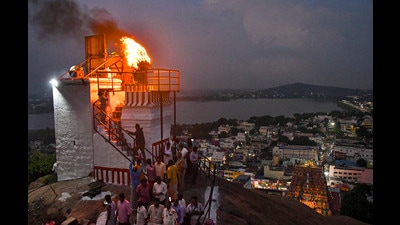 A lamp lit at Thiruparankundram temple as part of 'Karthigai Deepam' festival celebrations, in Madurai district, Tamil Nadu, on Wednesday. (PTI) A lamp lit at Thiruparankundram temple as part of 'Karthigai Deepam' festival celebrations, in Madurai district, Tamil Nadu, on Wednesday. (PTI)