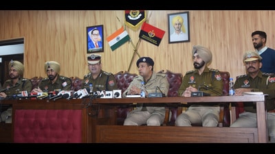 Commissioner of police Swapan Sharma with other officials during a media conference in Ludhiana on Wednesday. (HT Photo) Commissioner of police Swapan Sharma with other officials during a media conference in Ludhiana on Wednesday. (HT Photo)