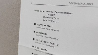 A sample ballot for the US House of Representatives Disctrict 7 in Tennessee shows the names of Republican Matt Van Epps and Democrat Aftyn Behn inside a polling location at Charlotte Park Elementary School on December 2, 2025 in Nashville, Tennessee. (Getty Images via AFP)