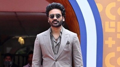 ధనుష్ కేవలం తన డ్రెస్ సరి చేయడానికే ఓ అసిస్టెంట్ను పెట్టుకున్నాడా.. సోషల్ మీడియాలో విమర్శలు.. సమర్థిస్తున్న ఫ్యాన్స్ (PTI) ధనుష్ కేవలం తన డ్రెస్ సరి చేయడానికే ఓ అసిస్టెంట్ను పెట్టుకున్నాడా.. సోషల్ మీడియాలో విమర్శలు.. సమర్థిస్తున్న ఫ్యాన్స్ (PTI)