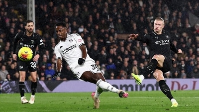 Erling Haaland shoots for his 100th Premier League career goal. (REUTERS)