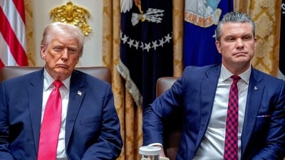 Pete Hegseth, US secretary of defense, with US President Donald Trump, left, and during a cabinet meeting at the White House in Washington, DC, US, on Tuesday, Dec. 2, 2025. (Bloomberg) Pete Hegseth, US secretary of defense, with US President Donald Trump, left, and during a cabinet meeting at the White House in Washington, DC, US, on Tuesday, Dec. 2, 2025. (Bloomberg)