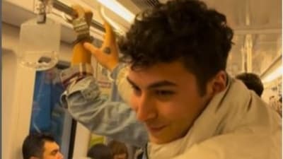 Video shows Emre Nalçakar handcuffing passenger in metro. (Instagram/emrenalcakarr)