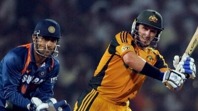 MS Dhoni and Michael Hussey during an ODI between India and Australia in 2009 (AFP)