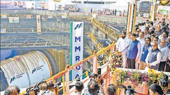 Mumbai, India. Dec 03, 2025 - The first Tunnel Boring Machine (TBM) for the Orange Gate to Marine Drive tunnel road project was launched in the presence of Chief Minister Devendra Fadnavis and Deputy Chief Minister Eknath Shinde at the front area, Princes Dock in Mumbai, India. Dec 03, 2025. (Photo by Raju Shinde/HT Photo) (Raju Shinde)