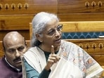 Union Finance Minister Nirmala Sitharaman speaks in Lok Sabha during the  the winter session of Parliament, in New Delhi on Wednesday. 