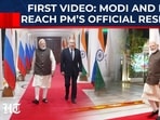 Prime Minister Narendra Modi and Russian President Vladimir Putin arrive at 7 LKM, the official residence of the Indian PM.
