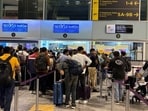 Queues at IndiGo counters at the Bengaluru airport on Wednesday. (REUTERS) Queues at IndiGo counters at the Bengaluru airport on Wednesday. (REUTERS)