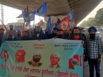Workers during a protest march in Ludhiana on Thursday. (Hindustan Times) Workers during a protest march in Ludhiana on Thursday. (Hindustan Times)
