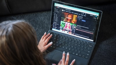 This photo taken on October 30, 2025 shows ten-year-old Bianca Navarro lying on the floor as she searches for a show on YouTube at her home in western Sydney. Australians younger than 16 will be removed from Facebook and Instagram on December 4, tech giant Meta said on November 20, 2025. (AFP) This photo taken on October 30, 2025 shows ten-year-old Bianca Navarro lying on the floor as she searches for a show on YouTube at her home in western Sydney. Australians younger than 16 will be removed from Facebook and Instagram on December 4, tech giant Meta said on November 20, 2025. (AFP)