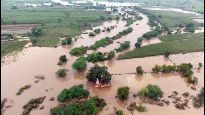 Dharashiv, India. Sep 27, 2025 - An aerial view of the flood-affected Devgaon village in the Dharashiv district shows the impact of heavy rains that have been battering Marathwada and Western Maharashtra. In just the past four days, eight people have lost their lives, and more than 150 villages have been affected by the intense downpour. Dharashiv, India. Sep 27, 2025. (Photo by Raju Shinde/HT Photo) (Raju Shinde) Dharashiv, India. Sep 27, 2025 - An aerial view of the flood-affected Devgaon village in the Dharashiv district shows the impact of heavy rains that have been battering Marathwada and Western Maharashtra. In just the past four days, eight people have lost their lives, and more than 150 villages have been affected by the intense downpour. Dharashiv, India. Sep 27, 2025. (Photo by Raju Shinde/HT Photo) (Raju Shinde)